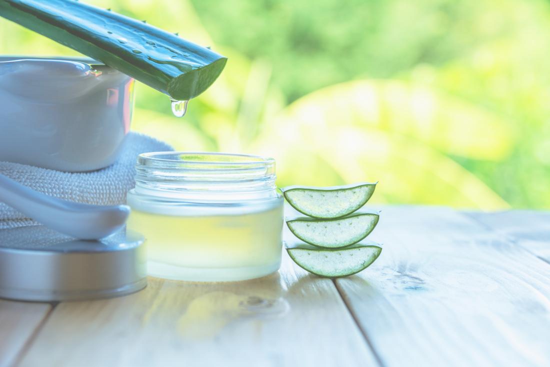 aloe-vera-for-acne-juice-of-plants-being-poured-into-cosmetics-jar-outdoors